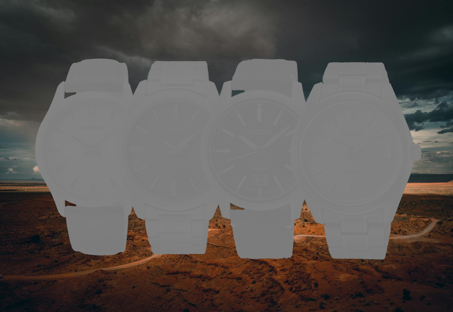 4 Seiko watches in black and white on a desert background